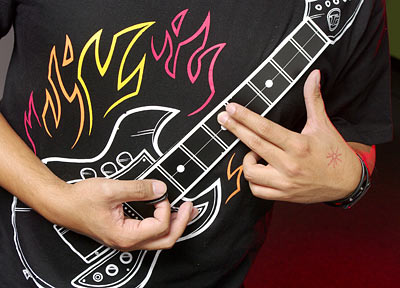 Playable Guitar T-shirt, guitar t-shirts, guitar playing t-shirts, t-shirts with guitar, guitar on t-shirts.